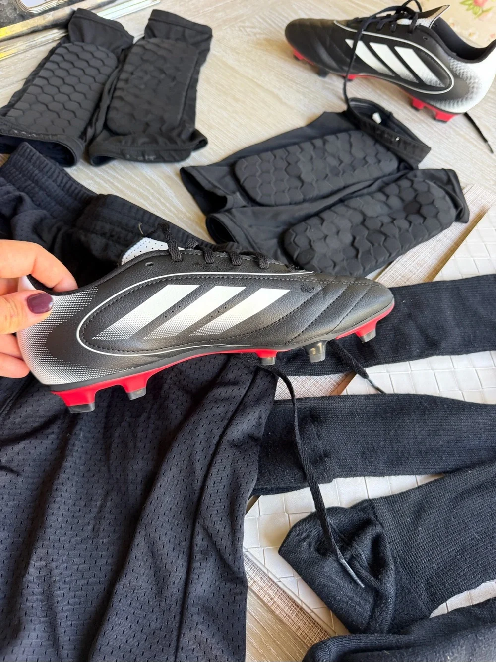 Black Men's Soccer Cleats with White Accents